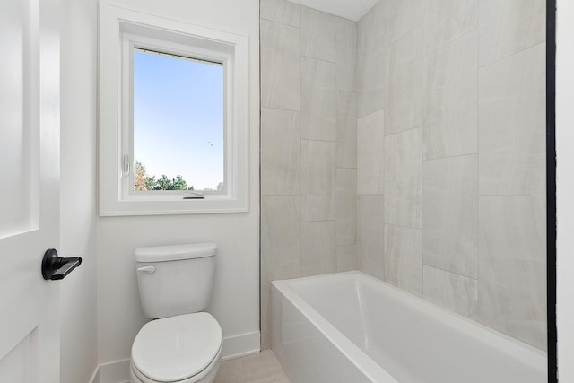 8035 Stanley Trl, Frankfort, IL 60423 - bathroom featuring toilet, baseboards, and bathtub / shower combination