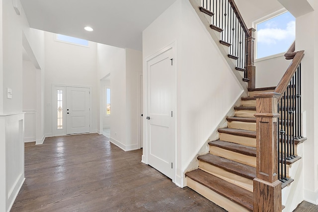 8035 Stanley Trl, Frankfort, IL 60423 - foyer entrance with plenty of natural light, stairway, wood finished floors, a towering ceiling, and recessed lighting