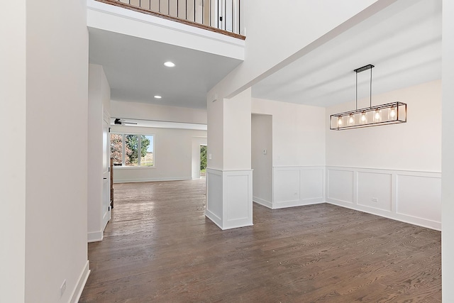 8035 Stanley Trl, Frankfort, IL 60423 - hallway featuring dark wood-style floors, recessed lighting, and a wainscoted wall