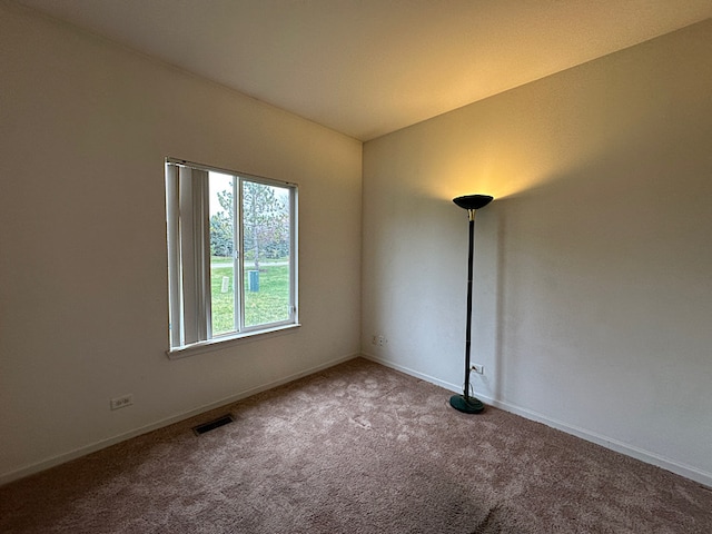 empty room featuring carpet floors