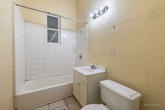 full bathroom with tile patterned flooring, vanity, toilet, and tiled shower / bath combo