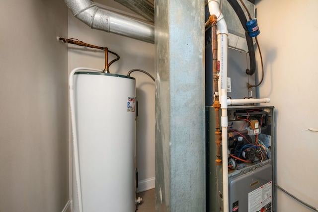 utility room featuring gas water heater