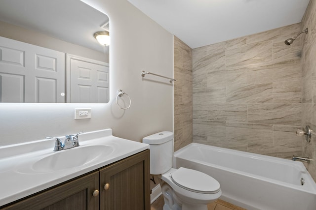 full bathroom with vanity, toilet, and tiled shower / bath combo