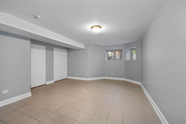 basement with light tile patterned floors