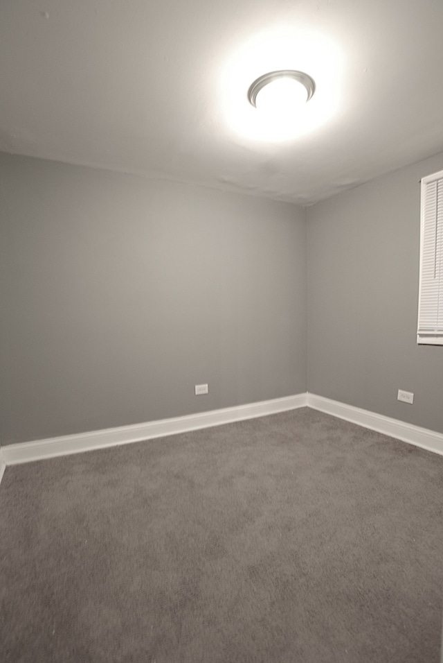 empty room featuring carpet floors