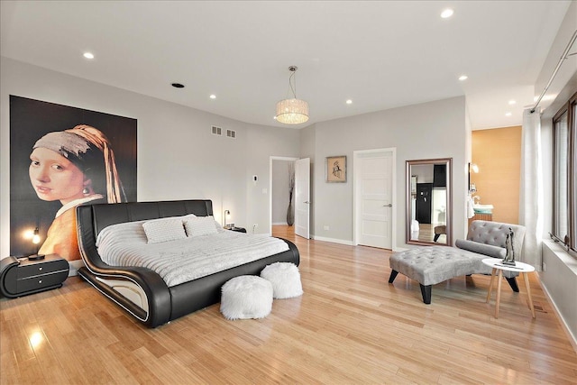 bedroom featuring light wood-type flooring