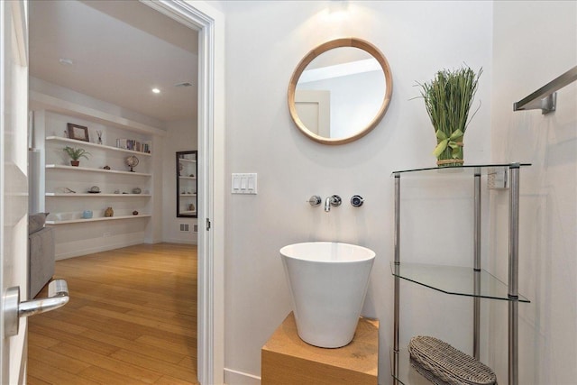 bathroom featuring hardwood / wood-style floors