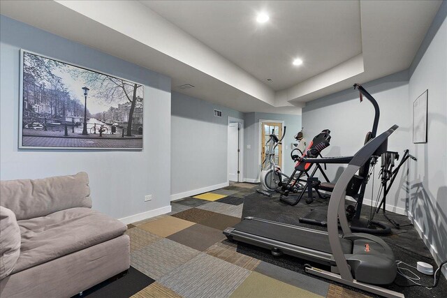 exercise area with dark colored carpet