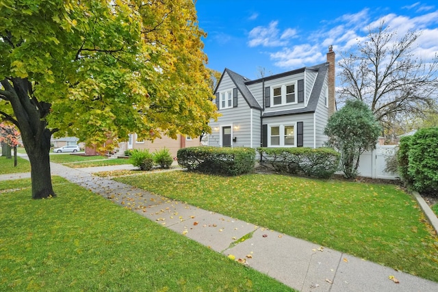 view of front of home with a front yard