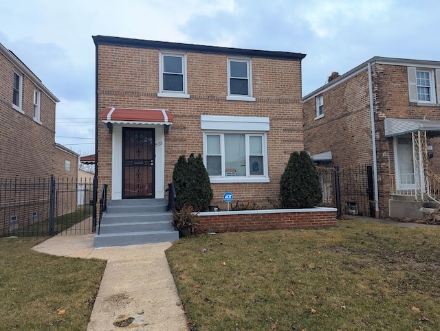 view of front facade featuring a front lawn