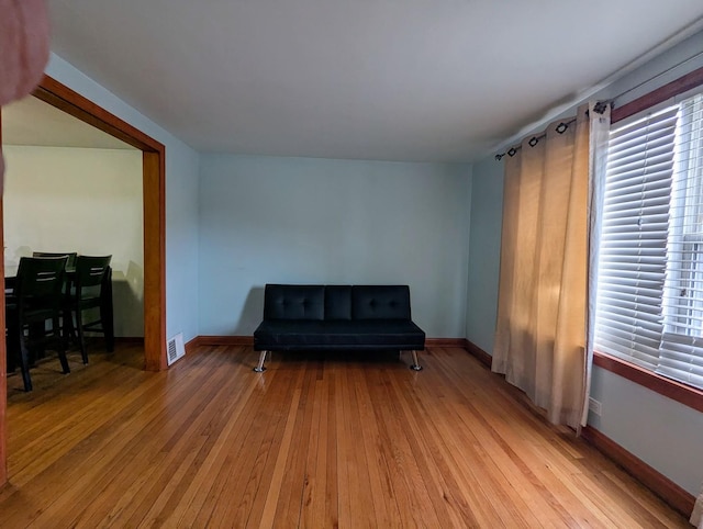 sitting room with light wood-type flooring