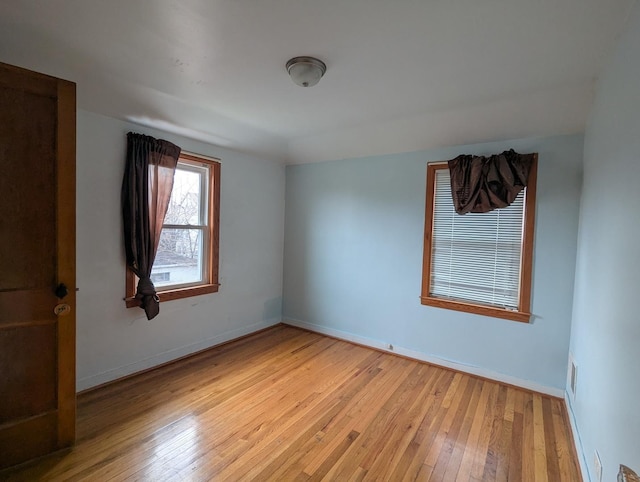 empty room with light wood-type flooring