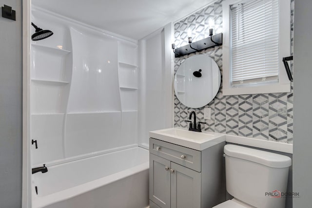 full bathroom with vanity, bathtub / shower combination, and toilet