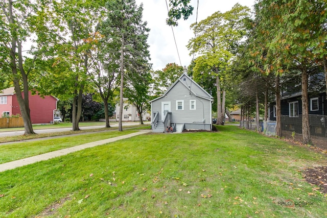 exterior space featuring a front yard