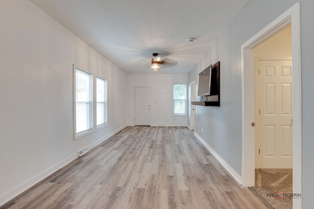 entryway with light hardwood / wood-style flooring