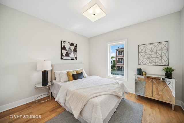 bedroom featuring hardwood / wood-style floors