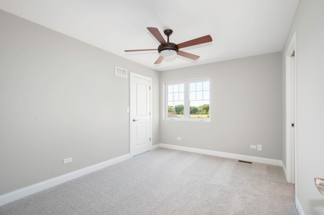 unfurnished bedroom featuring ceiling fan and carpet floors