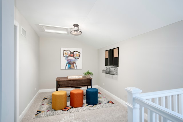 bedroom featuring carpet and a nursery area