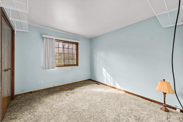 empty room featuring carpet flooring