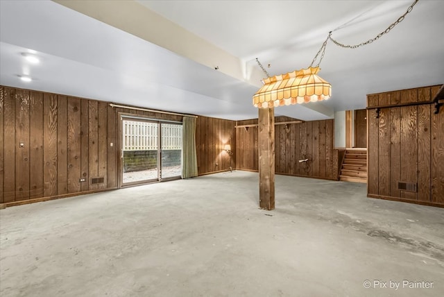 basement with wood walls