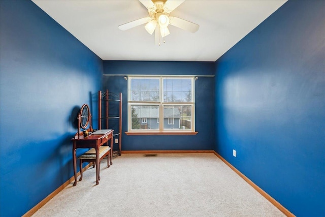 interior space featuring ceiling fan