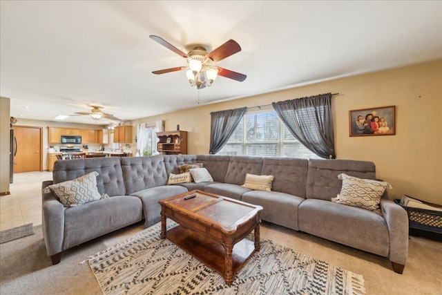 living room featuring ceiling fan