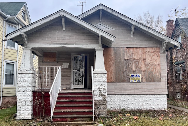 bungalow-style house featuring a porch