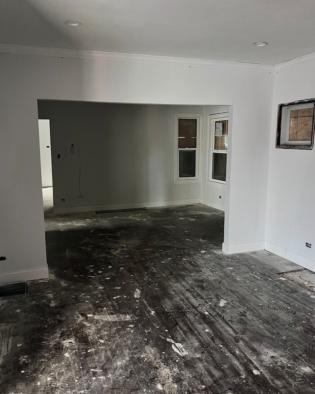 spare room featuring ornamental molding