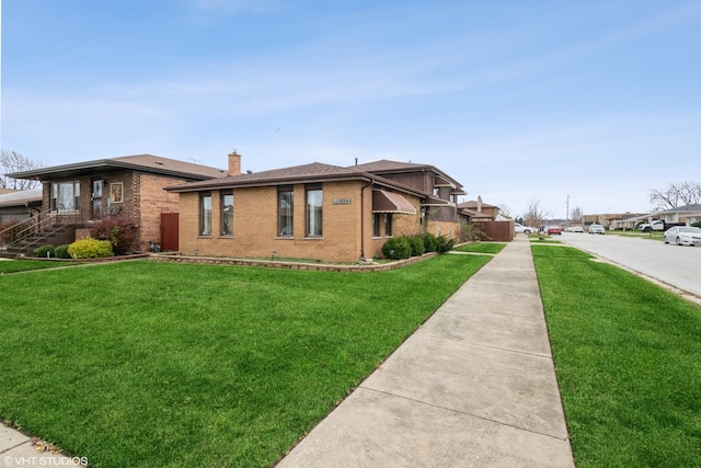 view of home's exterior with a yard