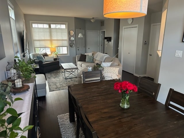 dining space featuring dark hardwood / wood-style flooring