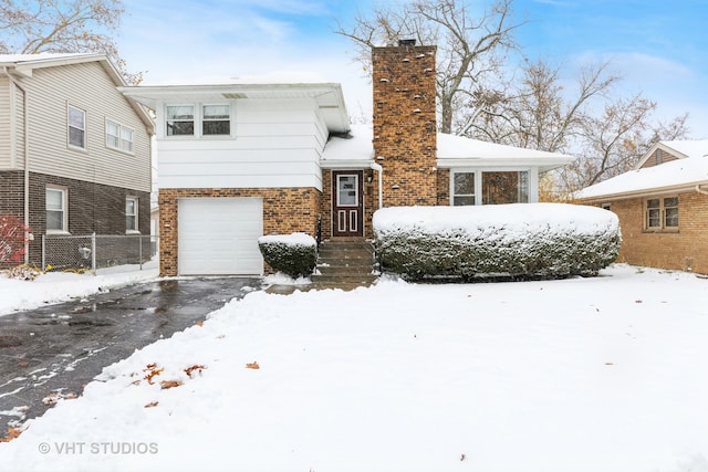 view of front of home featuring a garage