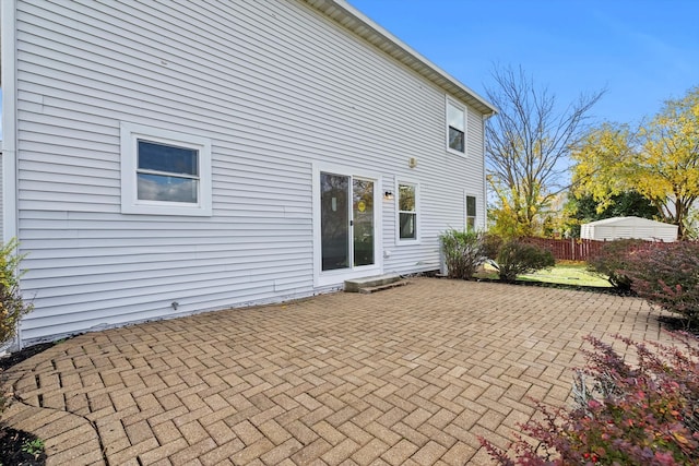 rear view of property featuring a patio area