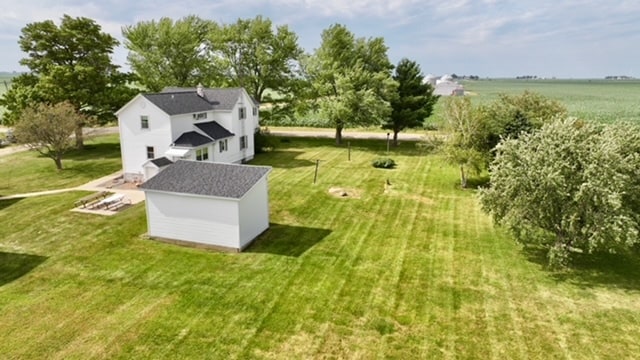 birds eye view of property featuring a rural view