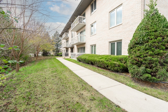 view of community featuring a yard