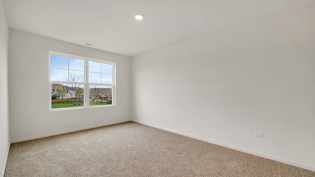 view of carpeted spare room