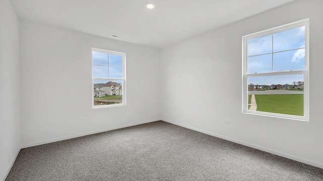 spare room with carpet flooring