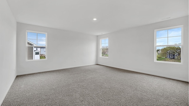 view of carpeted spare room