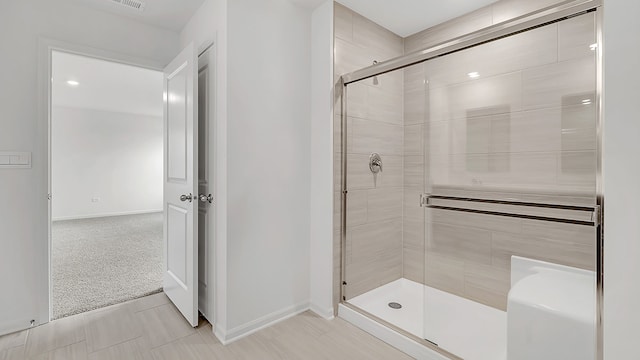 bathroom with an enclosed shower