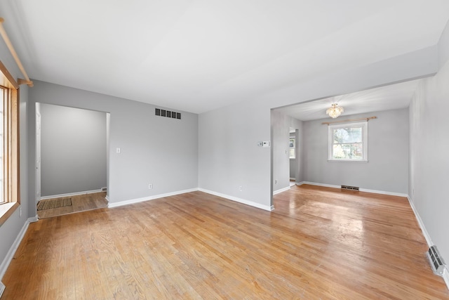 empty room with light wood-type flooring