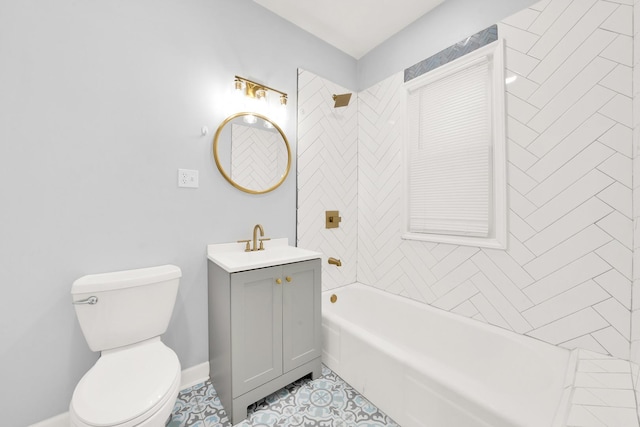 full bathroom with tile patterned flooring, vanity, toilet, and tiled shower / bath