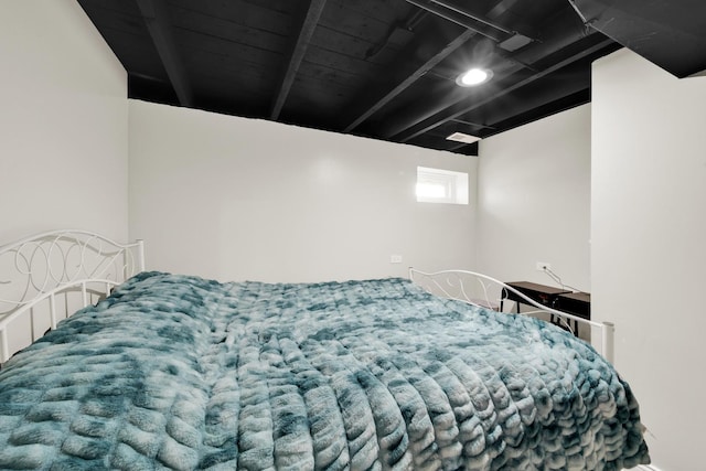 bedroom with beamed ceiling