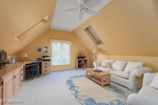 living room featuring light colored carpet, vaulted ceiling, and ceiling fan