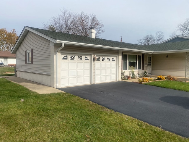 view of property exterior featuring a garage and a yard