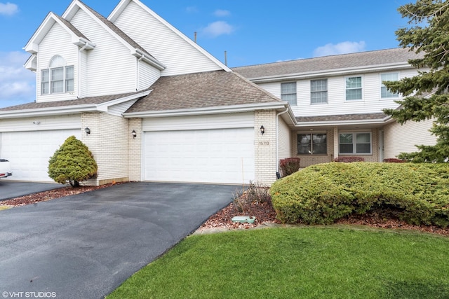 front facade with a garage