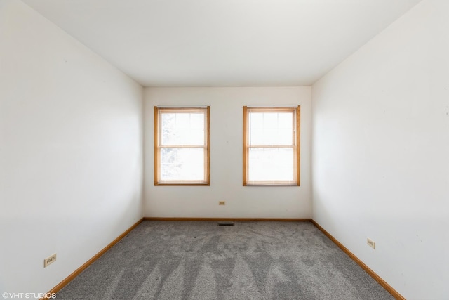 view of carpeted spare room