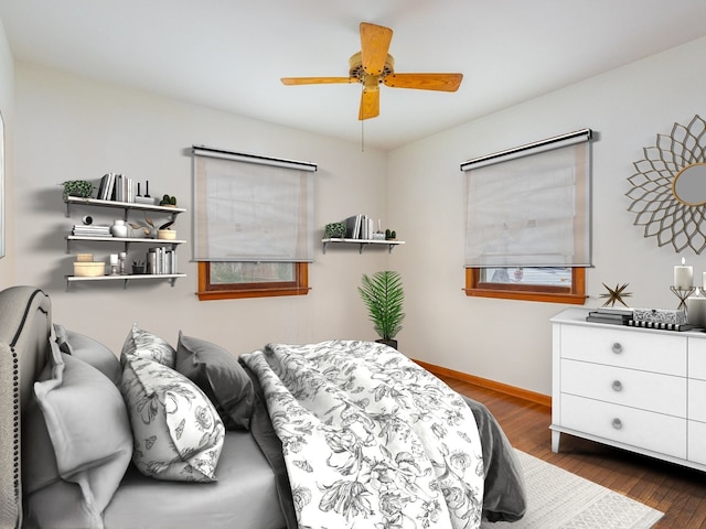 bedroom featuring dark hardwood / wood-style floors and ceiling fan