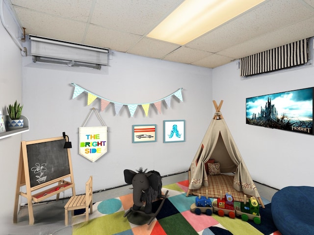 playroom with a drop ceiling