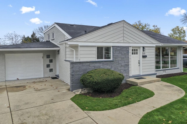 ranch-style home with a garage