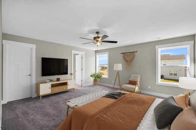 carpeted bedroom featuring ceiling fan