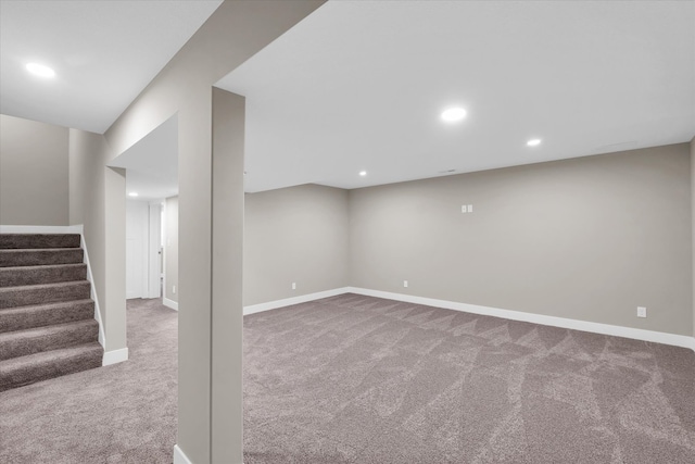 basement featuring carpet flooring